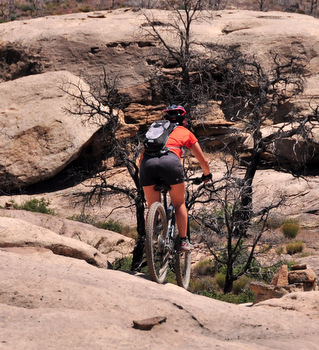 Judit making her way down the slickrock